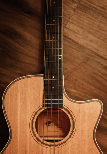 guitar on an wooden table