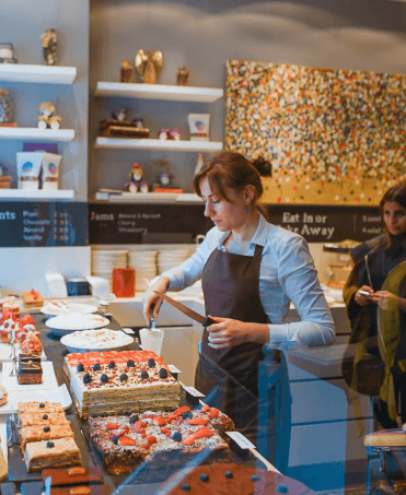 image of a chef arranging desserts