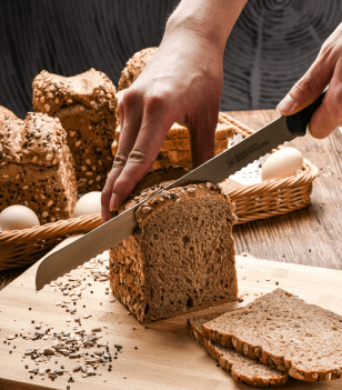 image of a bread cutting into bread loafs