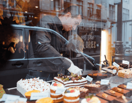 image of a chef arranging dessert in bekery